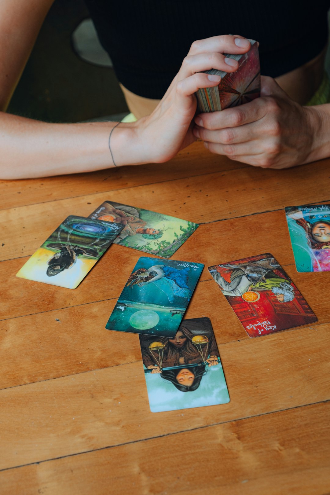 a-person-sitting-at-a-table-playing-a-game-mjin9f9mco4